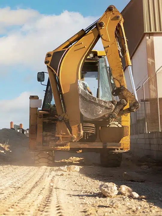 Demolition team efficiently destroying structures in Miami.
