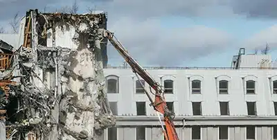 Structures in Miami are being methodically demolished and buildings cleared away.
